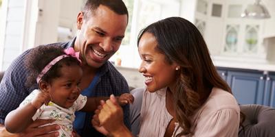 Couple playing with baby