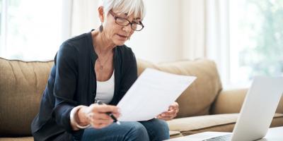 Woman reading spreadsheet